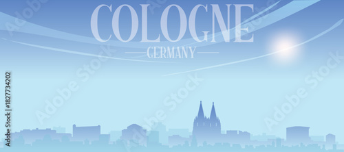 Blue panoramic poster of the city skyline with misty background buildings and clouds of COLOGNE, GERMANY