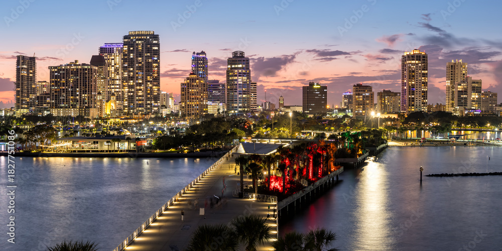 Fototapeta premium Saint Petersburg Florida skyline from above at Tampa Bay with St. Pete Pier panorama at night in downtown St Petersburg, United States