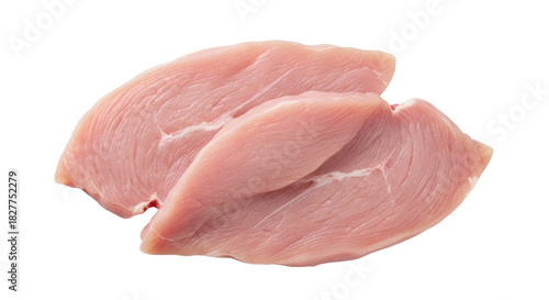 Isolated raw turkey breast cutlets on a neutral surface prepared for cooking and meal prep