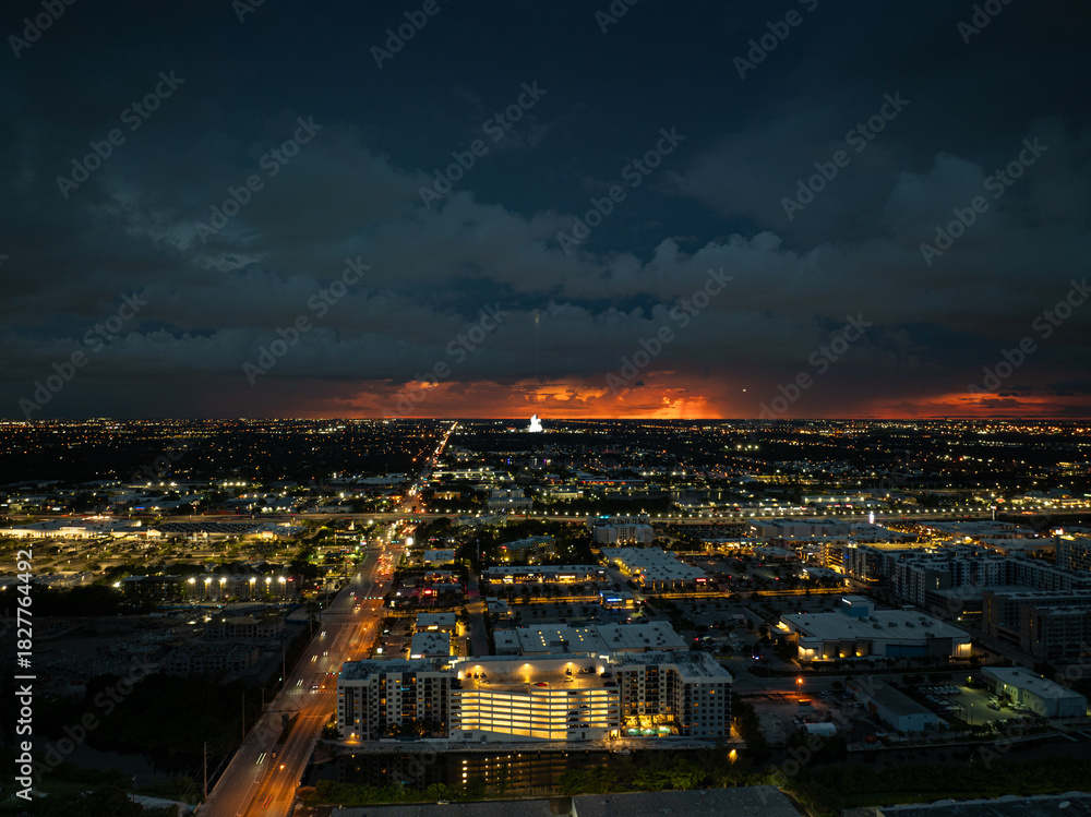 Fototapeta premium Dramatic storm clouds over Dania Beach area near Miami, Florida during evening aerial view