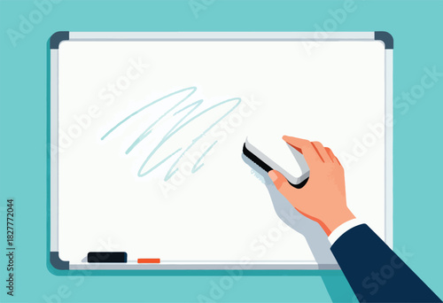 A hand, in a suit, erases scribbles on a whiteboard with an eraser, against a teal background