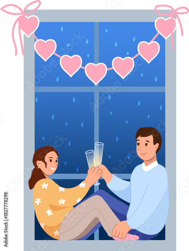 A romantic couple in love by a window for Valentine Day with champagne glasses