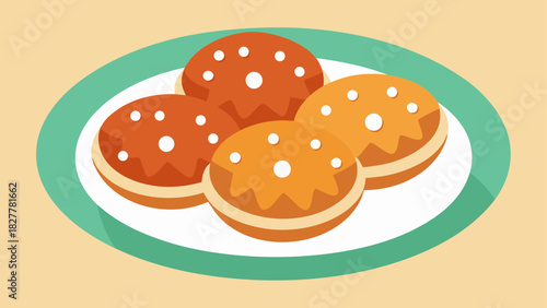 Four donuts on a plate with white dots