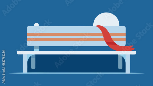 Bench with a red scarf and a white pillow