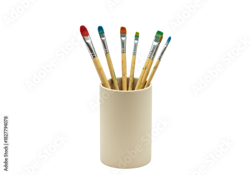 Isolated set of paintbrushes in holder, artist's drawing equipment, art studio supplies