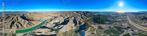 Aerial View of Lush Green Farm Fields Bordering the Advancing Desert in Southern Spain, Illustrating Desertification