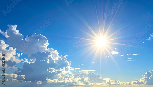 Fototapeta Naklejka Na Ścianę i Meble -  Bright, sunlit sky showcases puffy, white clouds surrounding a radiant sun with a brilliant display of light rays