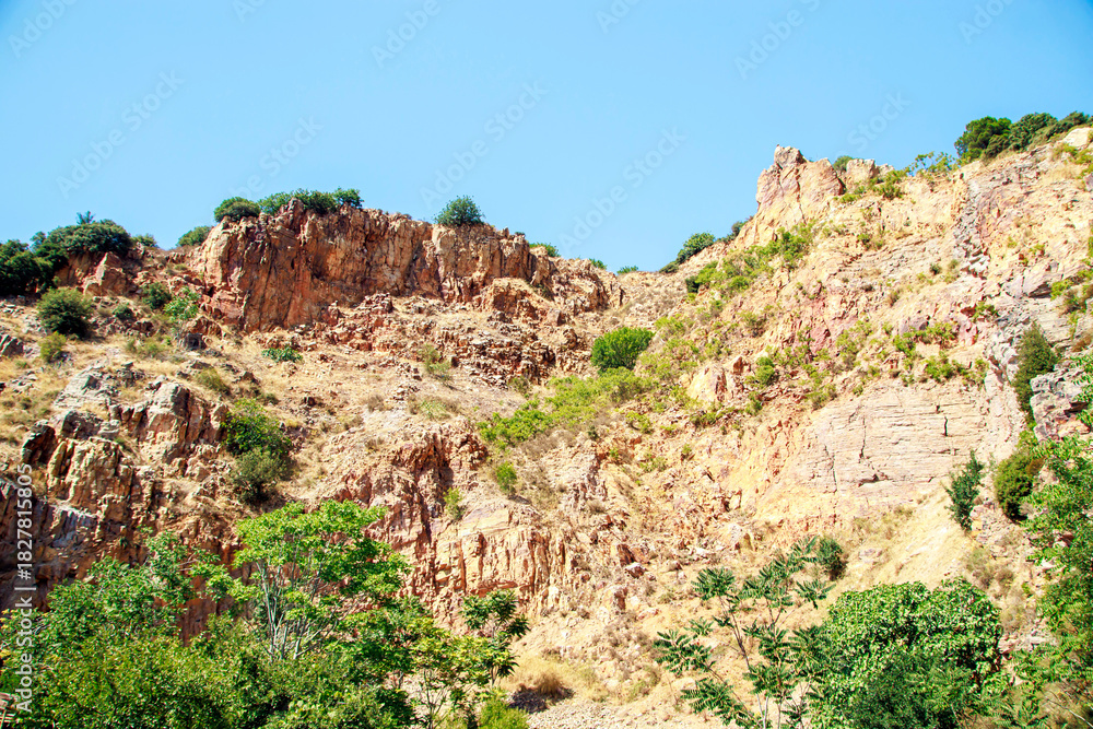 Fototapeta premium red rocks in the mountains in summer, kinali island istanbul
