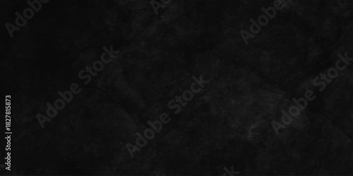 Black dark grunge stone texture with rough, natural crack wall surface background. uneven pattern resembling weathered black rock or charcoal. Panorama black canvas slate texture. marble background.