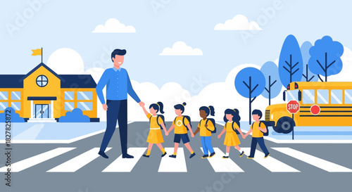 A school crossing guard assists children as they walk across a crosswalk near a school bus.