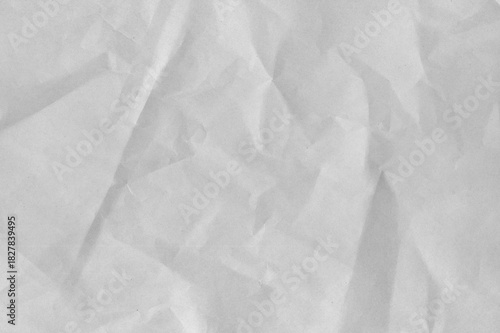 Crumpled natural newsprint texture for news paper backgrounds and wallpapers 