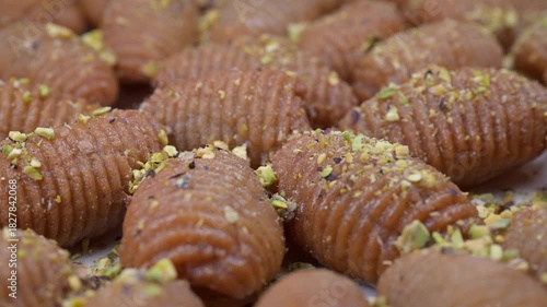 Lebanese recipe for Maakaroun fritters: fine wheat semolina, flour, butter, oil, ground anise. High quality 4k footage