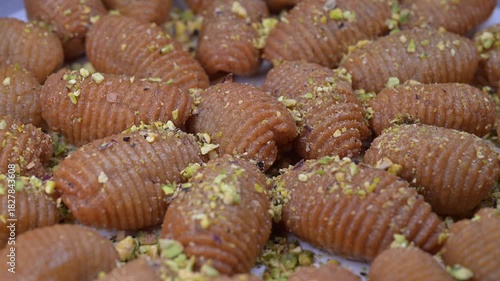 Lebanese recipe for Maakaroun fritters: fine wheat semolina, flour, butter, oil, ground anise. High quality 4k footage