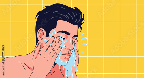 A young man splashes water on his face, performing a daily cleansing routine for fresh and healthy skin against a bright yellow tiled wall.
