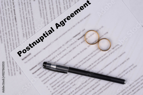 Postnuptial Marriage contract, Marital Settlement Separation Agreement  paper document symbolizing divorce, prenuptial contract, prenup, breakup for Canada, USA, United Kindom (UK).