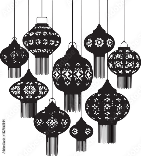Collection of decorative black paper lanterns with intricate patterns hanging