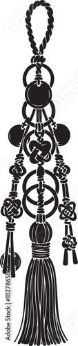 Ornate black skeleton charm with tassel and rings