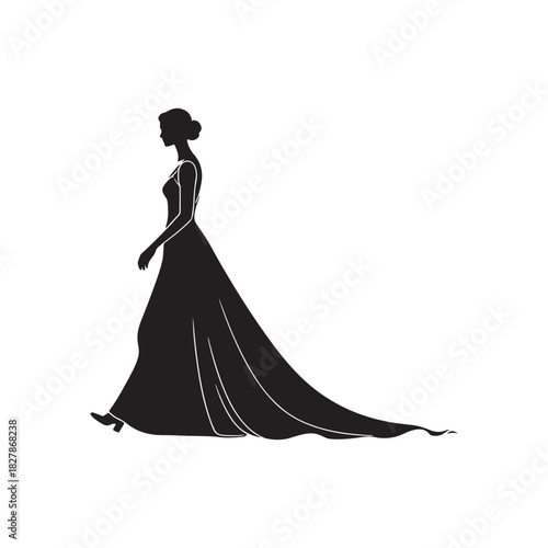 Silhouette of a bride walking gracefully in a long flowing gown