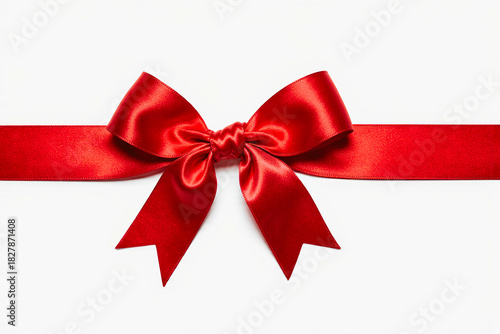 Vibrant red satin ribbon bow on a white background