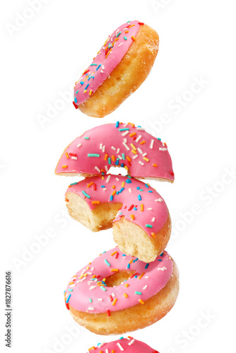 Creative concept of donuts on the white background. Desserts, bakery pastries.