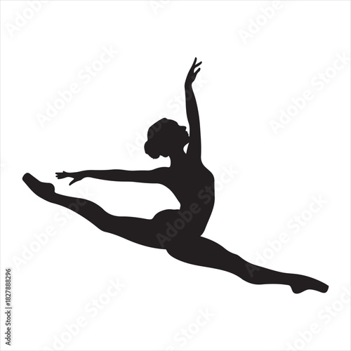 Silhouette of a female dancer performing a split leap in the air