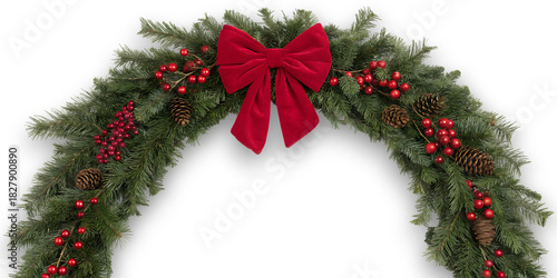 Festive green fir garland arch adorned with a large red velvet bow and red berry accents for holiday decoration