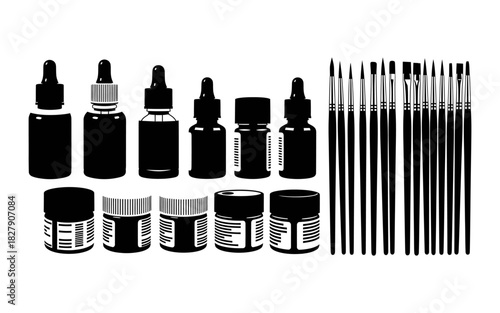 Collection of various art supplies including paint bottles and brushes.