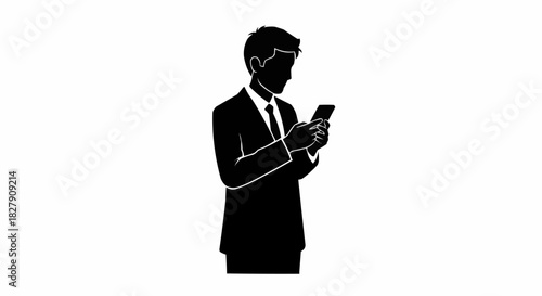 Businessman in suit focused on phone, checking messages or emails.