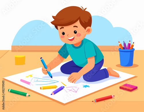 A young boy, kneeling on the floor, smiles as he draws with a blue marker on a large sheet of paper surrounded by colored pencils and crayons.