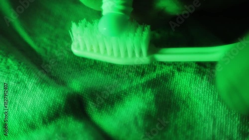 Stockholm, Sweden A person squeezes the last toothpaste out of a tube of toothpaste onto a toothbrush. 