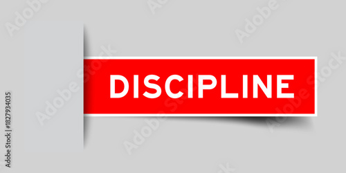 Red color square shape sticker label with word discipline inserted in gray background