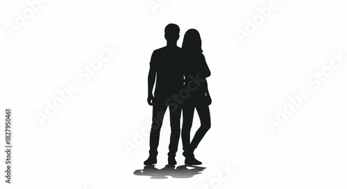 Silhouette of a young couple standing together in a loving embrace.
