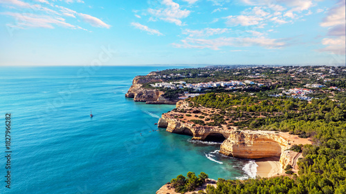 Aerial from the famous cave of Benagil and the little town Benagil on the southcoast in the Algarve Portugal