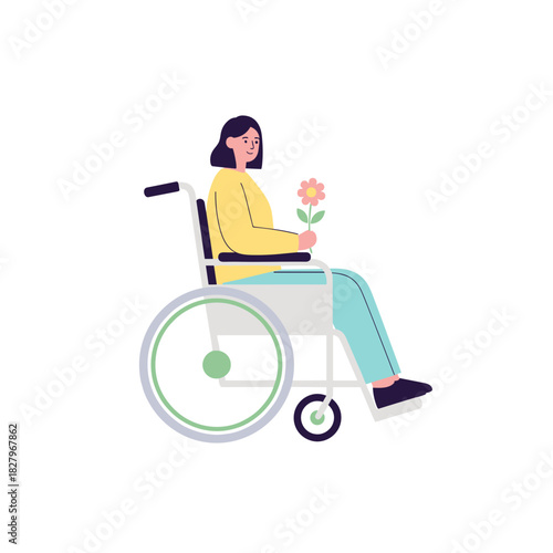 Young woman in wheelchair holding a flower while sitting outdoors  