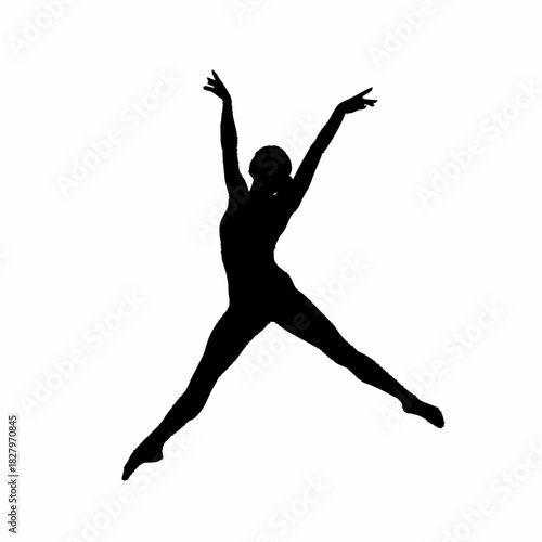 Silhouette of a Dancer in Mid-Leap with Arms Extended.