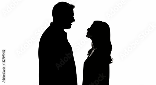 Black silhouette of a man and woman facing each other.