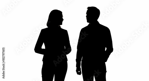 Silhouetted figures of a man and woman engaged in conversation.