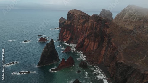 Dramatic view of Ponta de São Lourenço showcasing raw volcanic cliffs, turquoise Atlantic waters, and windswept terrain of Madeira’s most scenic coastal peninsula.