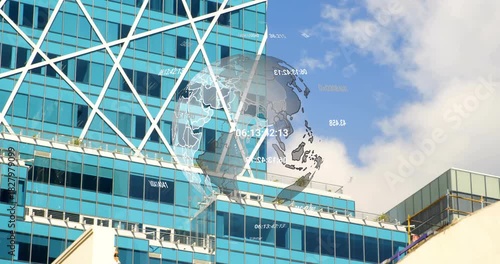 Sun glint starting holo blue glass tower projecting rotating globe with numeric tags showing data