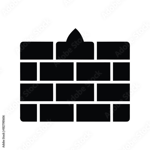 Monochrome depiction of a brick wall with a small decorative protrusion