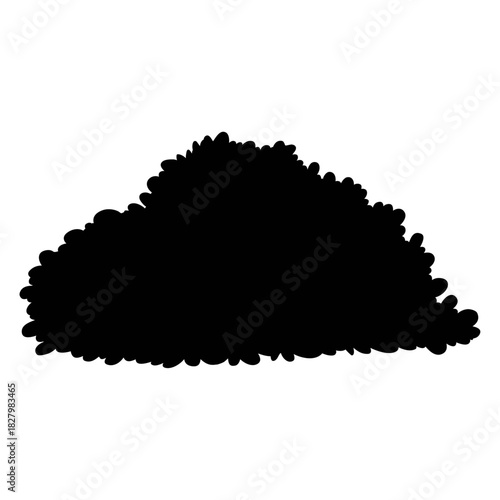 Silhouette of a Bush: The stark silhouette of a lush, untamed bush dominates the frame. Its dense, organic form contrasts dramatically against the backdrop.
