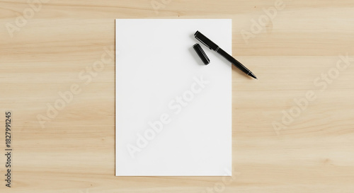 Blank White Paper with Pen on Wooden Desk, Ready to Write