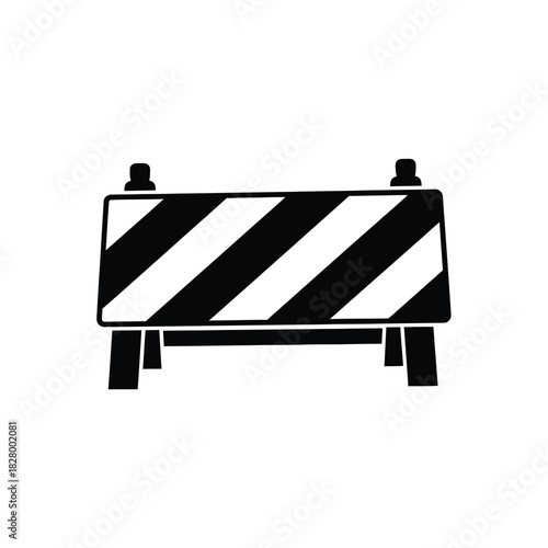Black and white traffic barrier with diagonal stripes