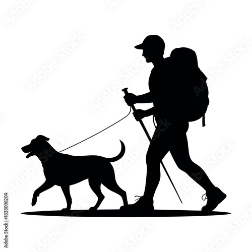 Silhouette of a hiker and dog walking together on a trail