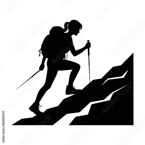 Silhouette of a hiker with trekking poles climbing a rocky mountain