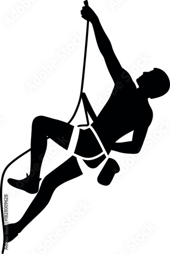 Silhouette of a rock climber ascending a steep vertical wall