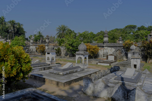 Fotografie historic tombs of the mir jafar dynasty with old stone structures, greenery and