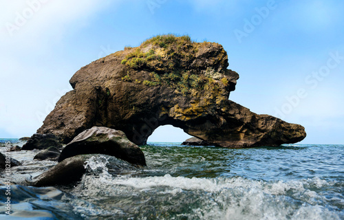Bild auf Leinwand Sea Arch Rock with Waves and Blue Sky