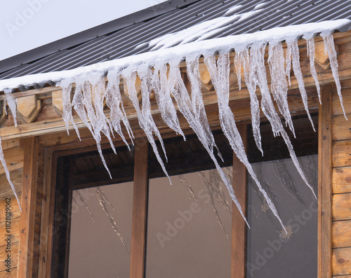 icicles hanging from a roof