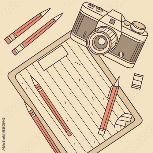 Overhead view of a vintage camera and pencils arranged on a wooden clipboard with a blank space for notes or sketches evoking creativity and artistic inspiration